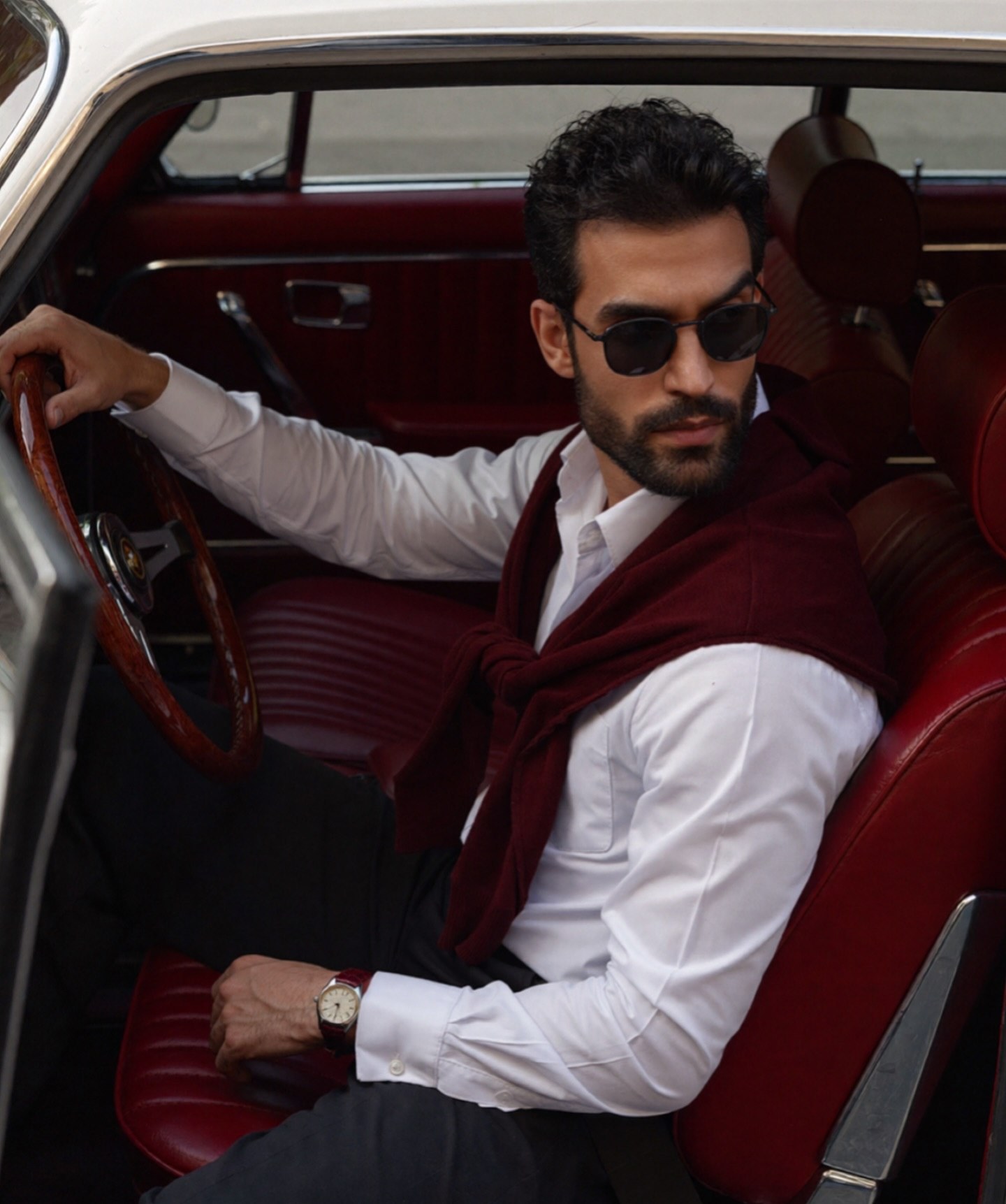 Saman Parham in a classic car